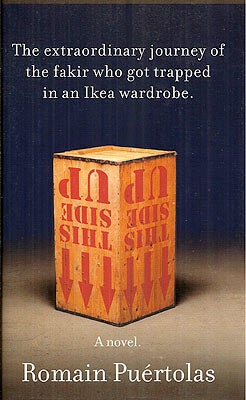 Item #55037 The Extraordinary Journey of the Fakir Who Got Trapped in an Ikea Wardrobe. Romain Puertolas.